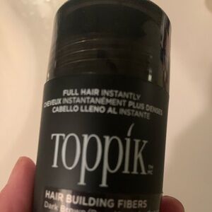19 bottles of dark brown Toppik